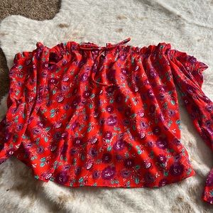 Off the shoulder red shirt